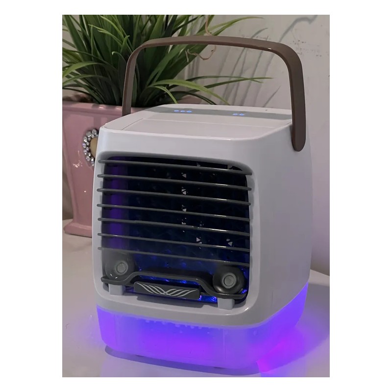 ChillWell 2.0 Portable Air Cooler on a table with its night light on